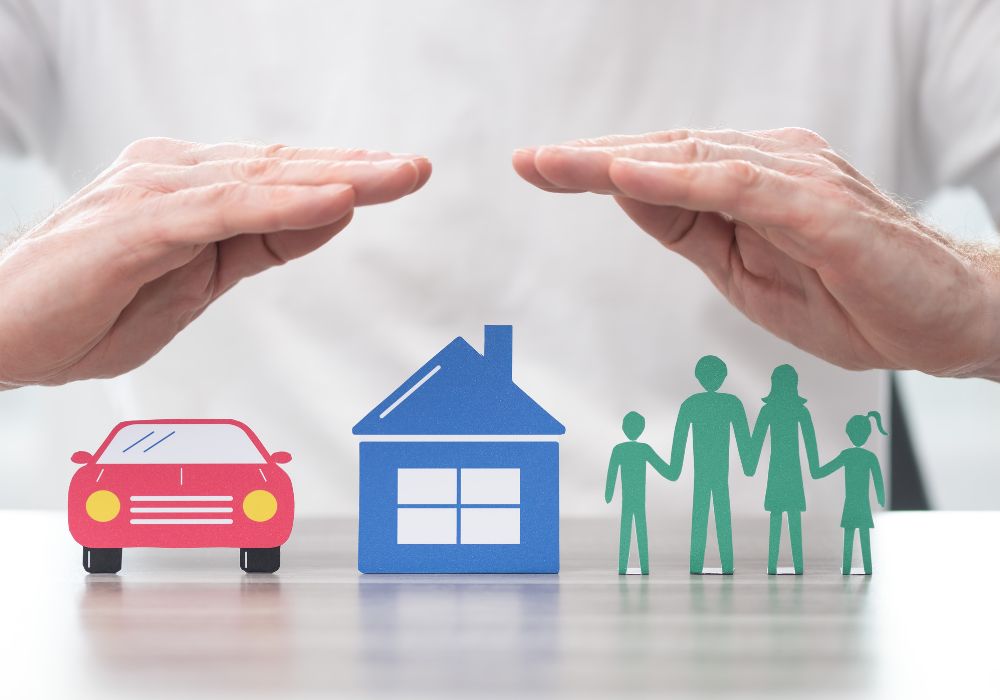 house, car family protected by hands