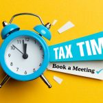 clock and note to remind you to book a tax meeting