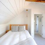 beautiful naural coloured cosy bedroom in a rental holiday house